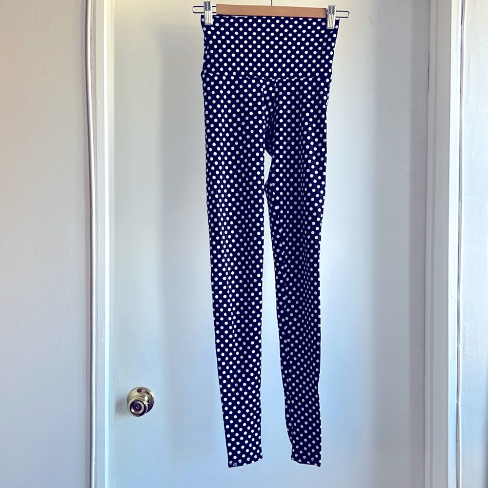 The Onzie leggings. Black with white polka dots leggings. Size: XS.